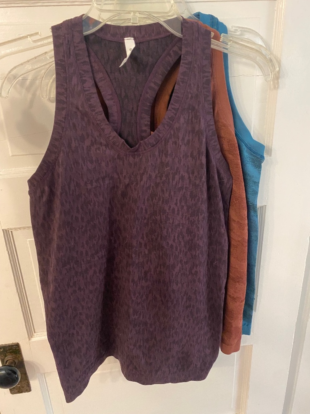 Athleta racerback tanks, lot of three, size small, blue, purple, and brown